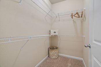 Walk-In Closet With Built-In Shelving